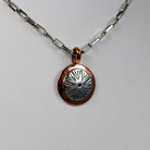 Navajo Round Stamped Sterling and Copper Pendant