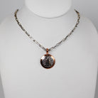 Navajo Round Stamped Sterling and Copper Pendant