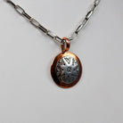 Round Stamped Sterling and Copper Pendant
