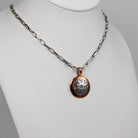 Round Stamped Sterling and Copper Pendant