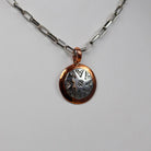 Round Stamped Sterling and Copper Pendant