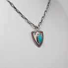 Shield Pendant With Turquoise Inlay